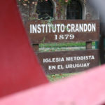 Cartel IMU en jardín
